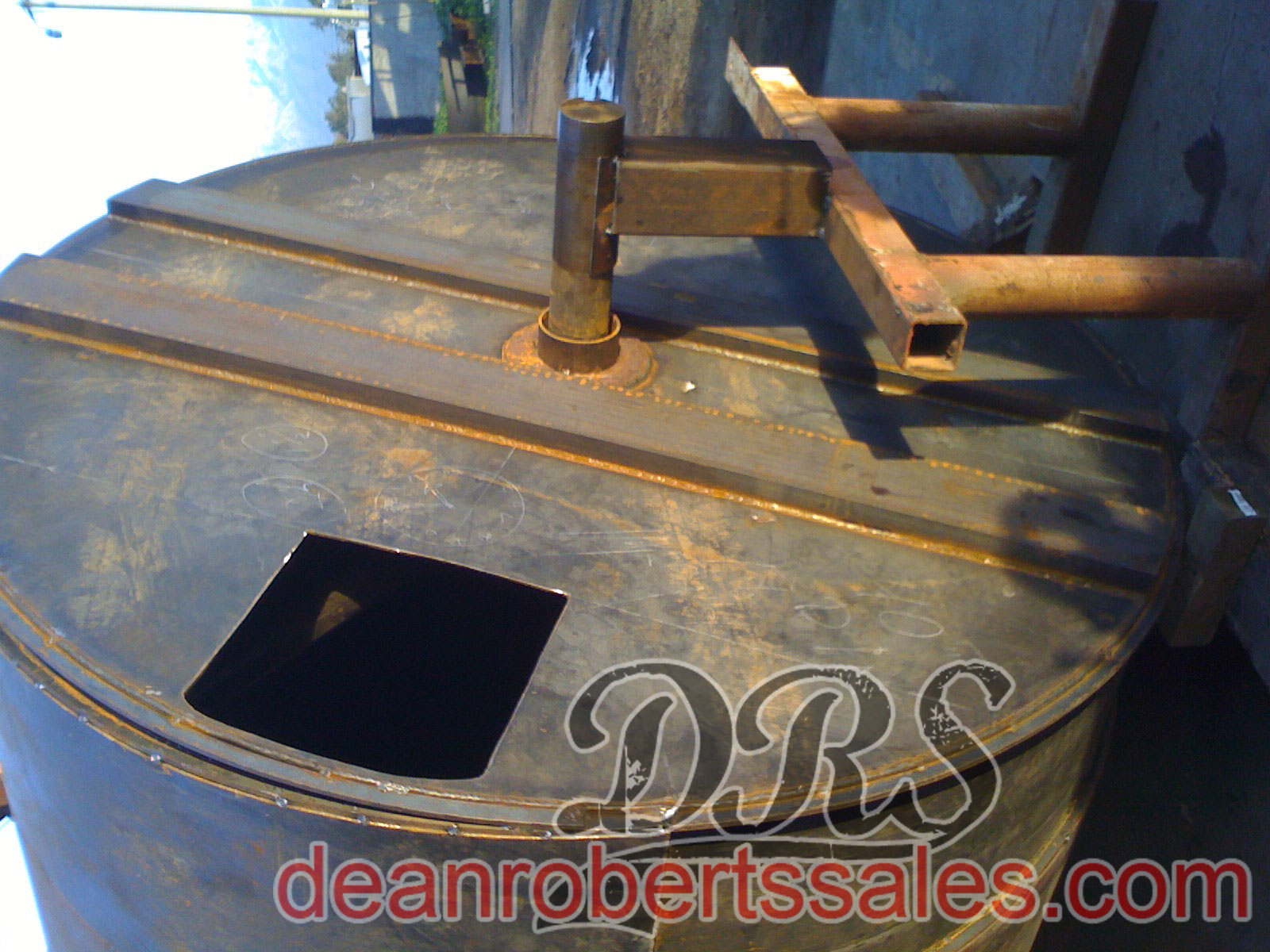 CUSTOM SPECIALTY SEALCOAT TANKS TRUCKS AND HELICAL MIXERS BY DEAN ROBERTS SALES.