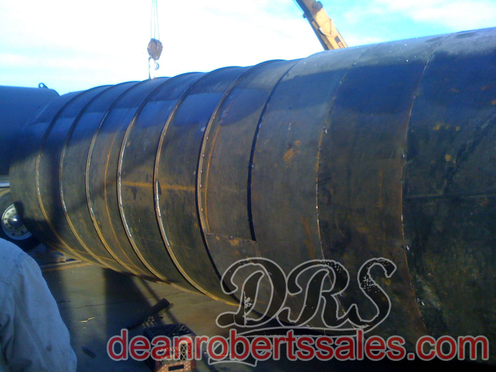 CUSTOM SPECIALTY SEALCOAT TANKS TRUCKS AND HELICAL MIXERS BY DEAN ROBERTS SALES.