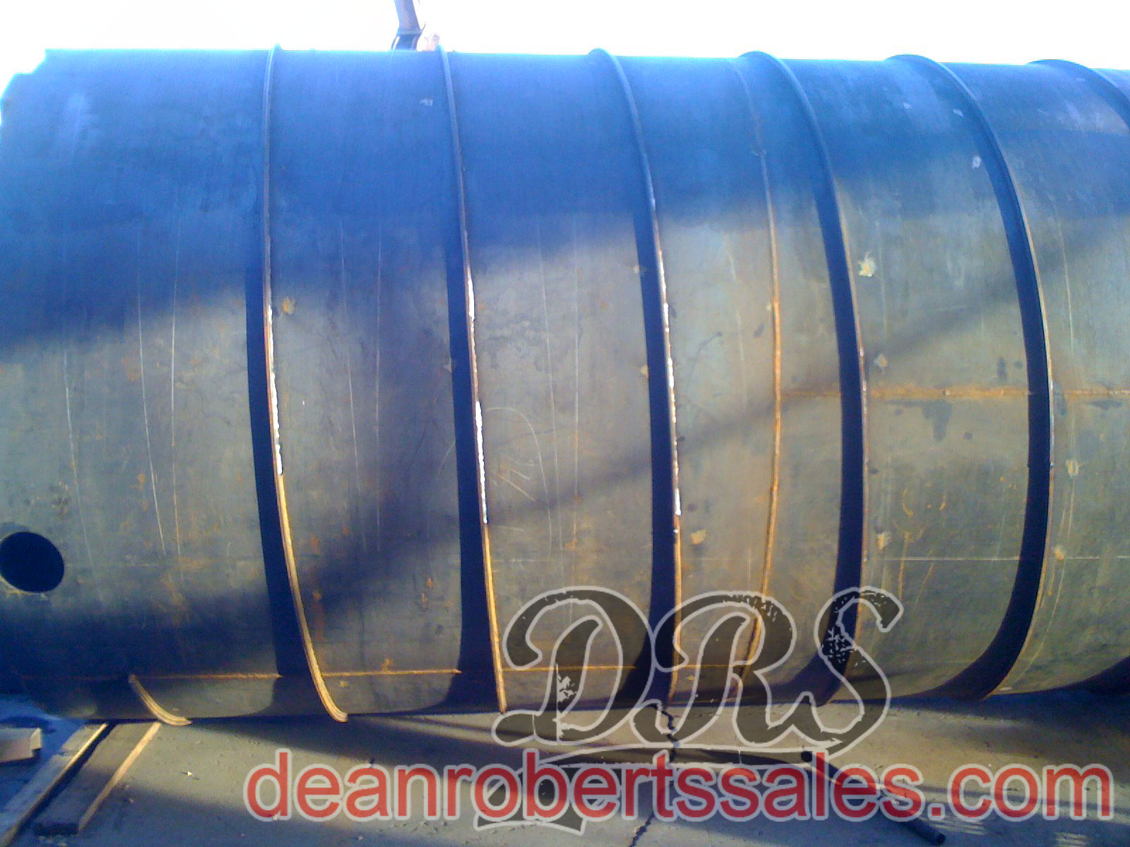 CUSTOM SPECIALTY SEALCOAT TANKS TRUCKS AND HELICAL MIXERS BY DEAN ROBERTS SALES.